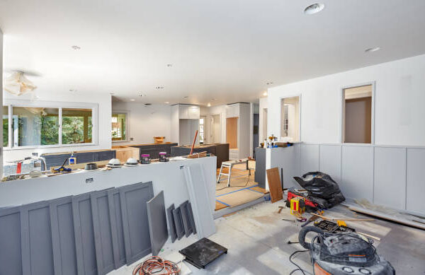A bright Lafayette kitchen remodeling with two large windows letting in natural light and offering a beautiful outdoor view.