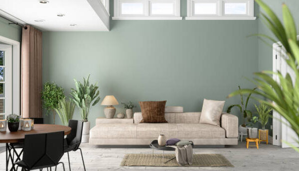 Stylish modern living room with elegant wood paneling and a warm fireplace, reflecting a contemporary aesthetic.
